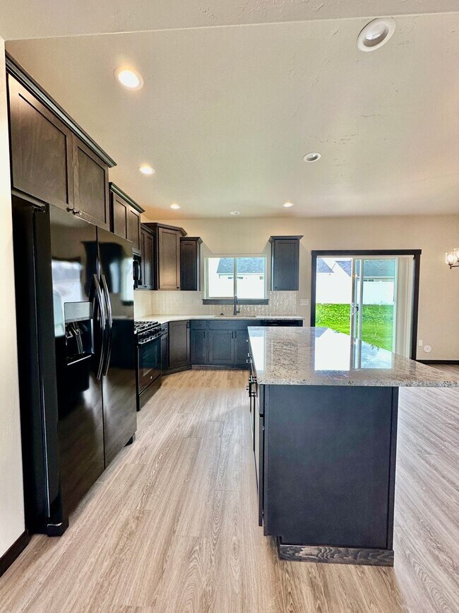Building Photo - Newly Built 4-Bedroom Home | Chef’s Kitche...