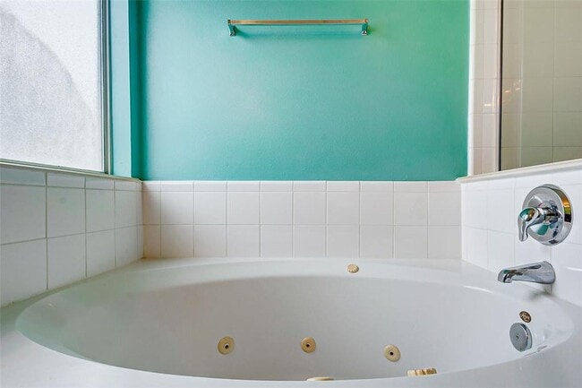 Building Photo - This one-story, three-bedroom, two bath ho...