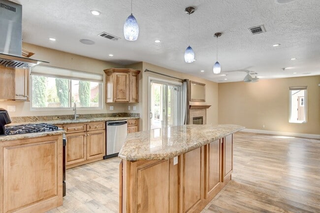 Building Photo - Gorgeous 4 Bedroom, 2 Story Home with a Beautiful Pool in the Lakes!