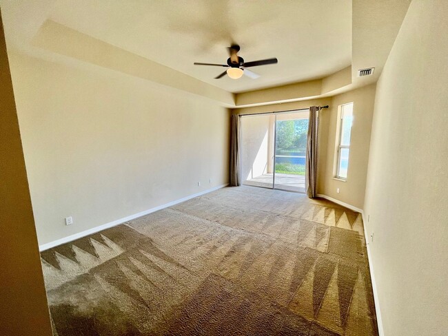 Building Photo - Meadows of Estero 1st floor unit with 2 ca...