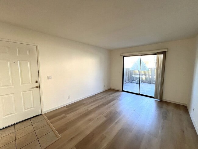 Building Photo - Ground Level 2 Bedroom Condo with Private Patio in Gated Community for Lease