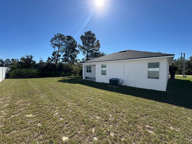 Building Photo - $500 OFF OF A MONTH OF RENT! Beautiful 4BD/2BA Home in Poinciana – No HOA Approval Needed! Pets W...