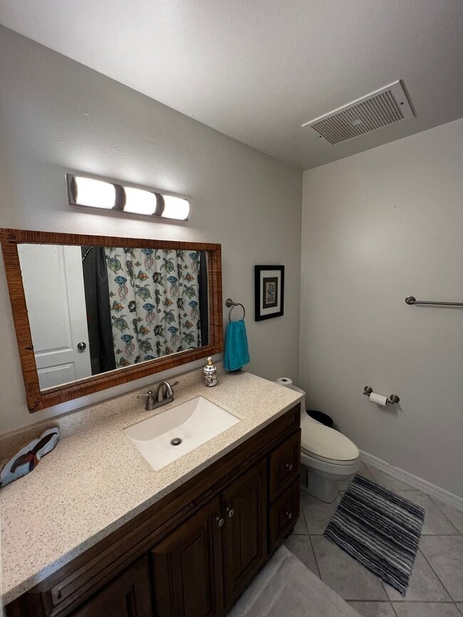 Building Photo - Furnished 2 bedroom 2 bath condo with assigned parking stalls