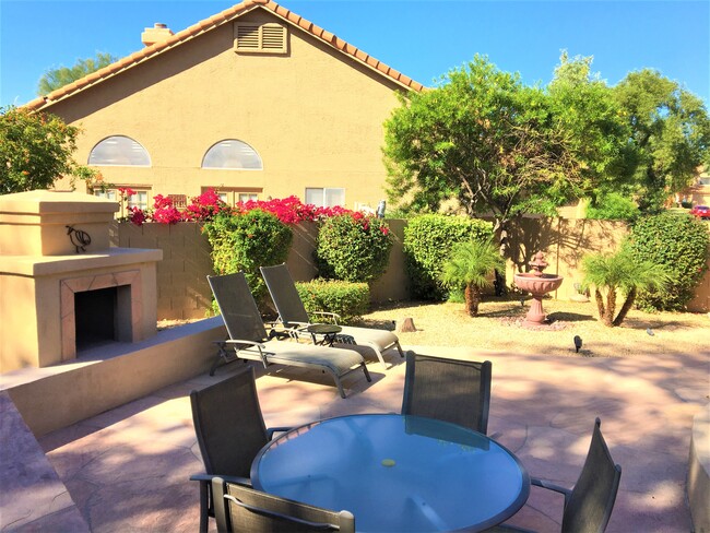 Flagstone Patio with Water Feature. - 9257 E Sutton Dr