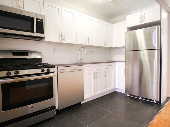 Primary Photo - "Spacious 3-Bedroom Gem with 2 Full Baths ...