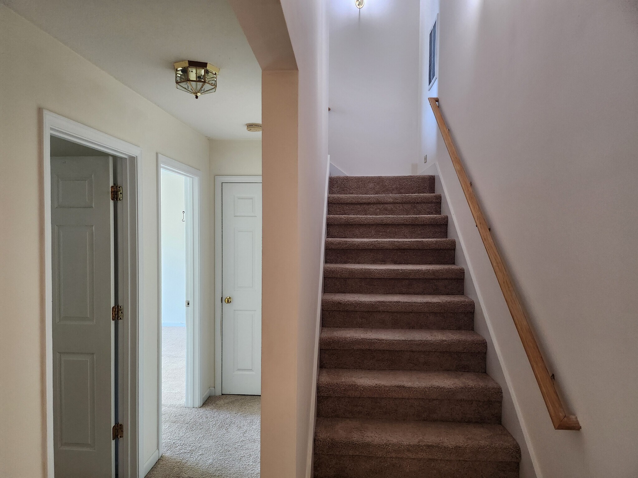 Stairs up to bedroom 2, 3 - 1719 Wood Song Ln