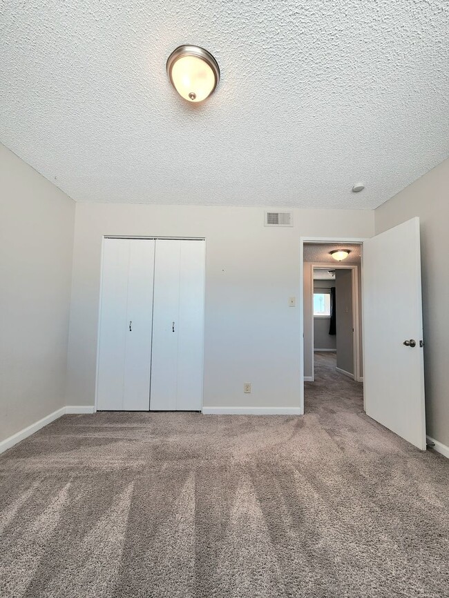 Building Photo - 4 Bedroom Two-Story Home with Downstairs Primary Bedroom & Fireplace