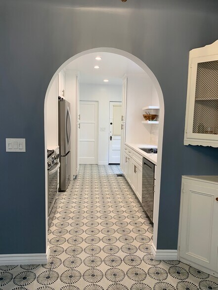 Kitchen with brand new stainless steel appliances - 8673 W Olympic Blvd