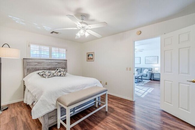 Building Photo - Pending/ Rented - Turnkey Charm in Green Valley – Furnished Townhome with Gated Serenity!