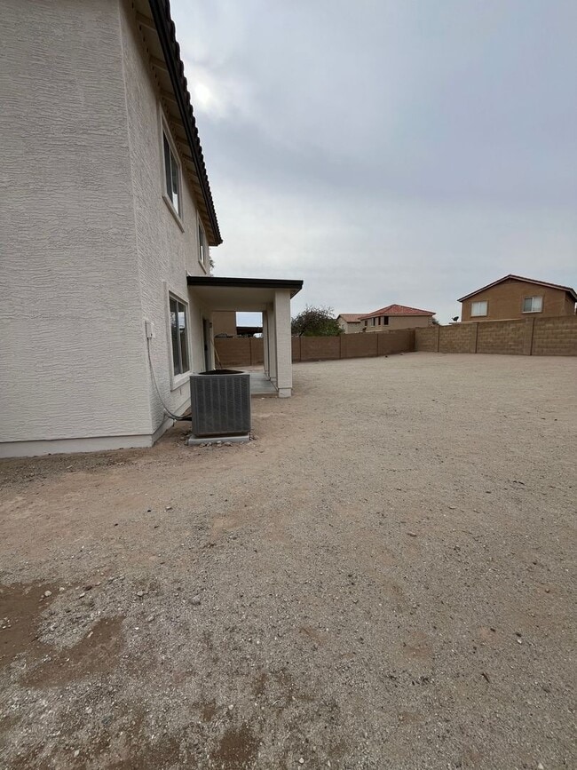 Building Photo - Buckeye, 4 bed, 2.5 bath, huge lot, across...