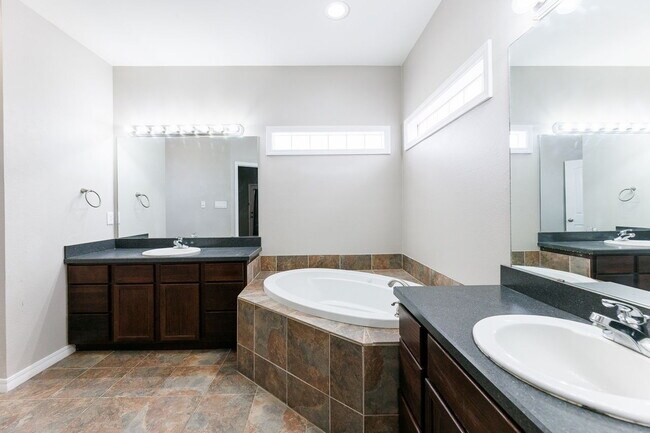 Building Photo - Spacious 3-Bedroom in Gated Community