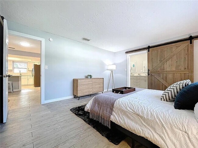 Building Photo - Modern luxury meets Florida charm in this ...