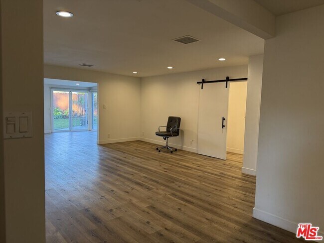 Building Photo - 8541 Dempsey Ave