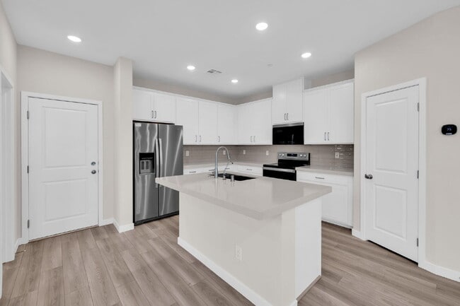 Building Photo - BRAND NEW - NEVER LIVED IN 3 BR/2.5 BA Townhouse across the street from Henderson Hospital and Me...