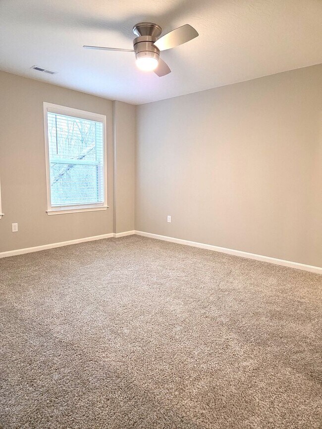 Building Photo - Exquisite brand new condo w/everything! Ground floor, no stairs, attached garage