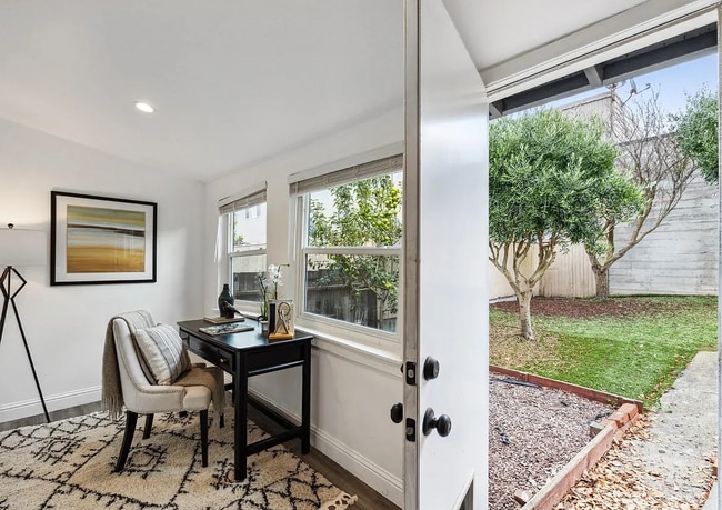 Building Photo - Renovated cottage on huge lot! This stylis...