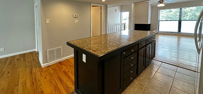 Island includes a pull out garbage and lots of drawers and other cabinet space - 6724 Eastridge Dr