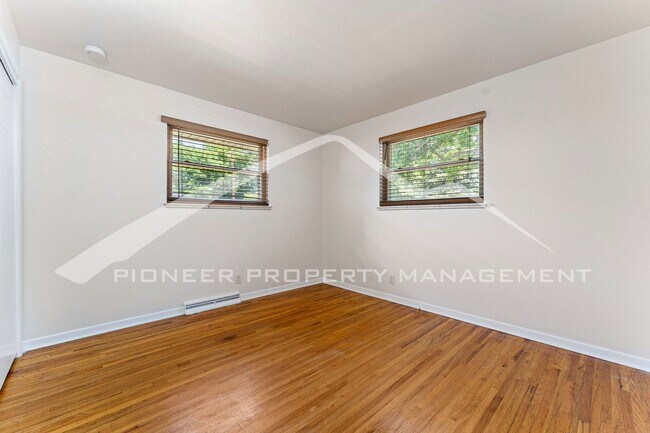 Building Photo - Spacious Home with Fenced Yard and Central AC