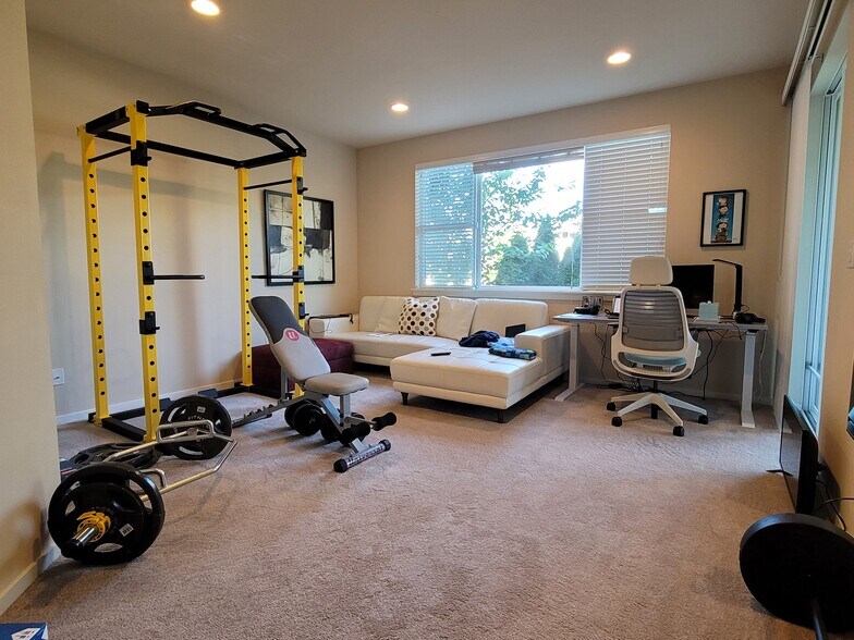 Living space downstairs - 562 Alpine Ridge Pl NW