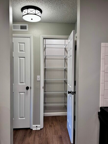 Pantry with new shelving. - 122 Turnwood Ln
