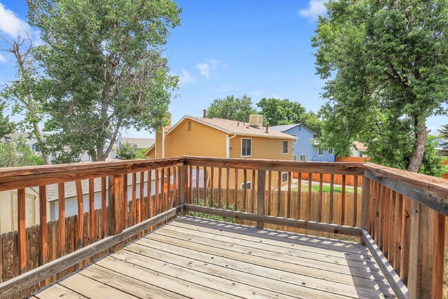 Building Photo - $2,720.95 - 4 bed, 2 bath, located in Aurora with attached Garage and In Unit Washer and Dryer!