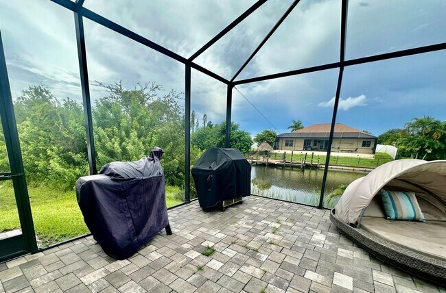 Building Photo - Fully Furnished Annual Rental- 3 Bedroom 2 Bathroom - Pool and Waterfront- NE CAPE CORAL