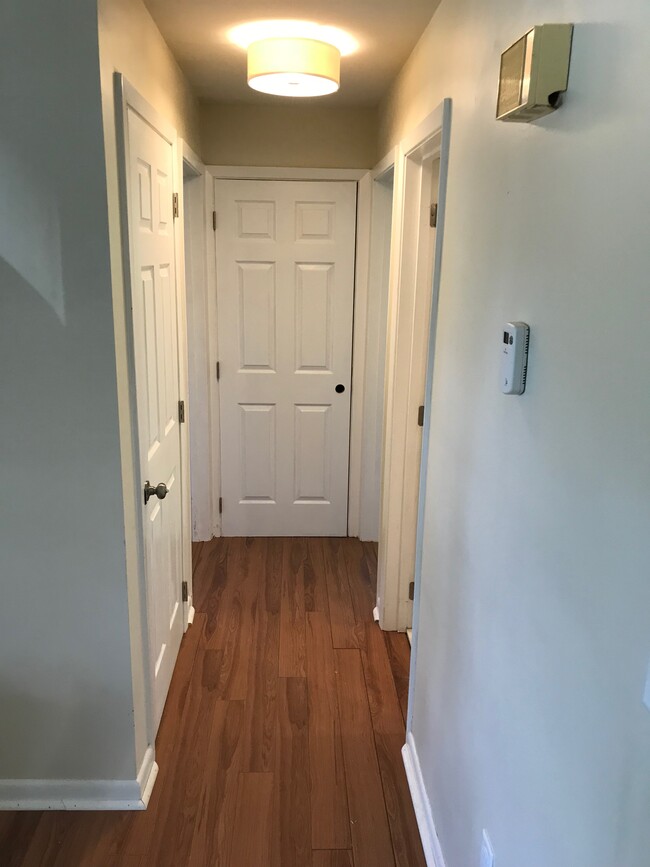 Hallway - Closet straight ahead. Bath 1st door on right. Bedroom 2 second door on right. - 614 Perimeter Drive