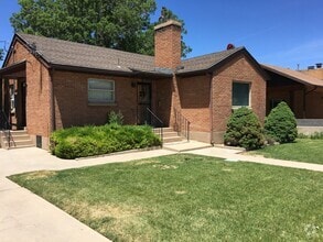 Building Photo - 4 bed - 2 bath Charming single family home...