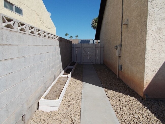 Building Photo - Spacious 4-Bedroom, 3-Bathroom Home with Open Floor Plan & Large Backyard – Prime Location!