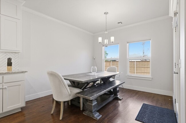 Building Photo - Stunner! This beautiful home features a spacious open floor plan with primary suite and private o...