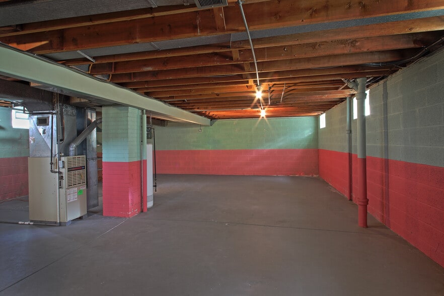 This large space can be a home office. Currently being repainted, warm tones - 2186 Chesterland Ave