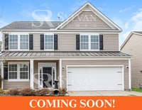 Building Photo - Feel welcome in this well-maintained 4BR 2...