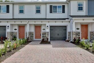 Building Photo - Brand-New 3/3 Modern Townhome in Gated Tys...