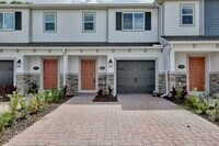 Building Photo - Brand-New 3/3 Modern Townhome in Gated Tys...