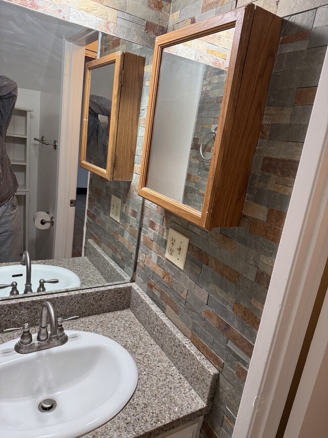 Downstairs bathroom newly installed slate backsplash - 200 Elm Ave