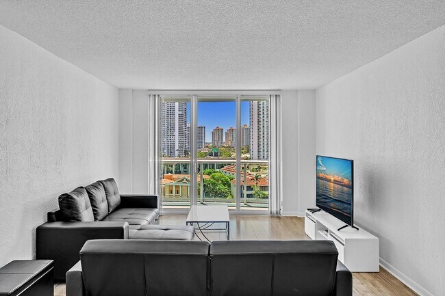 Building Photo - 19390 Collins Ave