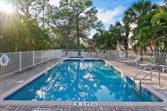 Building Photo - Two Bedroom/Two and a half bath gated townhome.