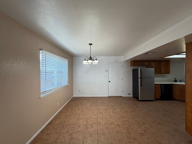 Building Photo - Wow Check out this 3 BD 2 BA SW Charmer near White Ln & Akers Road