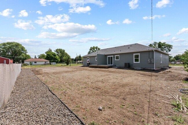 Building Photo - Newly built 4 Bedroom Duplex With Garage