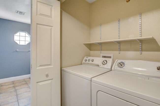 Building Photo - Gorgeous 4 Bedroom, 2 Story Home with a Beautiful Pool in the Lakes!