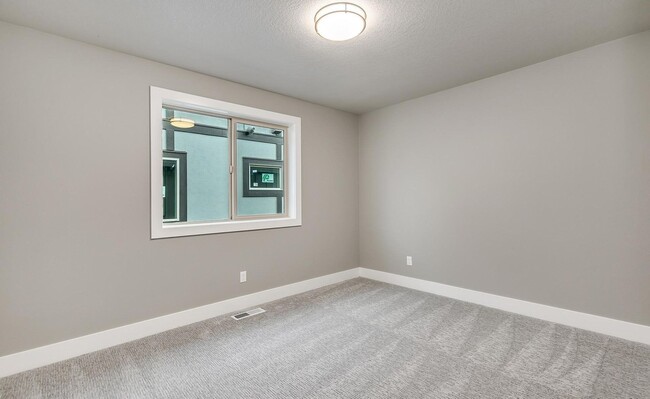 Building Photo - Bethany Stunner - 5 Bedrooms with Main-Level Bed & Bath, Modern Kitchen & Private Fenced Yard