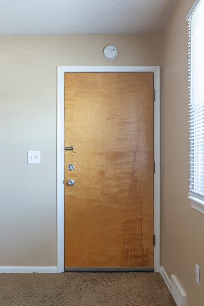 Interior front entrance of a unit at Square 131 - 8 Plex. - Square 131 - 8 Plex