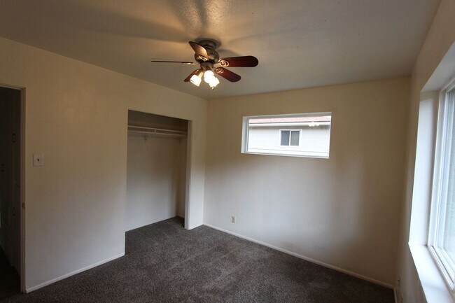 Building Photo - COMING AUGUST | 3-Bedroom Home in Bow & Arrow Acres | Large Yard + Wood-Burning Fireplace