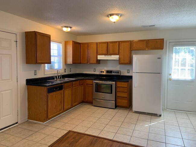 Building Photo - 4 Bedroom Home close to HWY 421 & I40