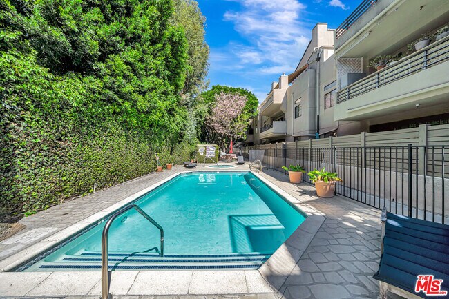 Building Photo - 4477 Woodman Ave