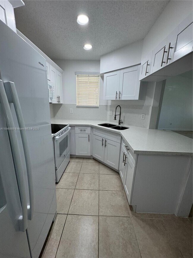 Building Photo - 18346 NW 68th Ave