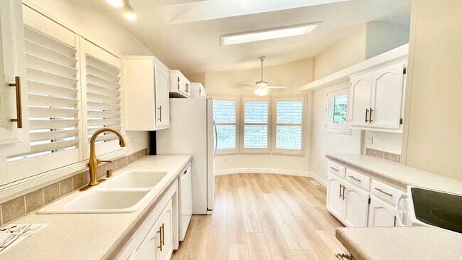 Building Photo - Light, Bright, and Freshly Updated Home in the Gated & Desirable Champagne Village 55+ Community!