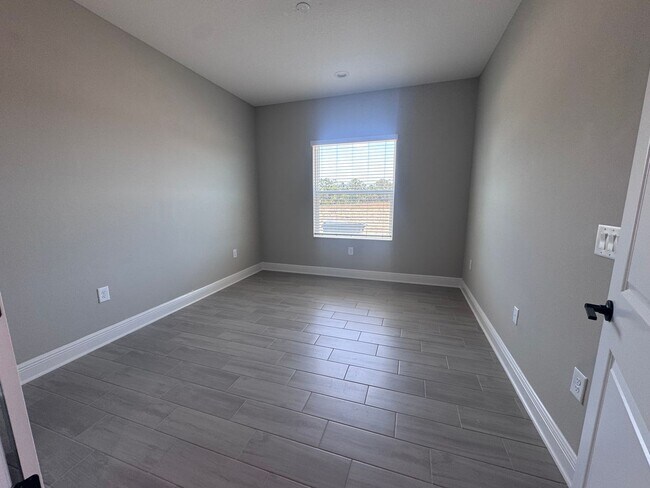Building Photo - New Construction in Grand Park-4 Bedrooms and 4 Bathrooms with a Den and a Loft! No deposit for q...