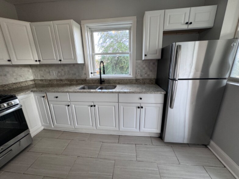 Building Photo - 7436 S Colfax Ave