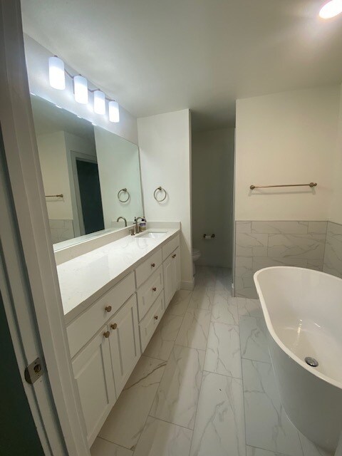 Large Primary Bath with Soaking Tub and Marble Shower - 4714 29th St